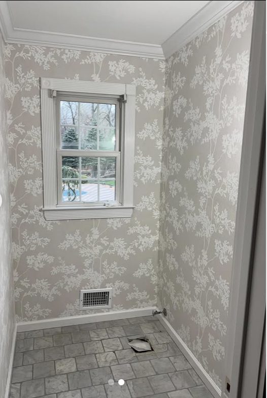 Room after wallpaper installation